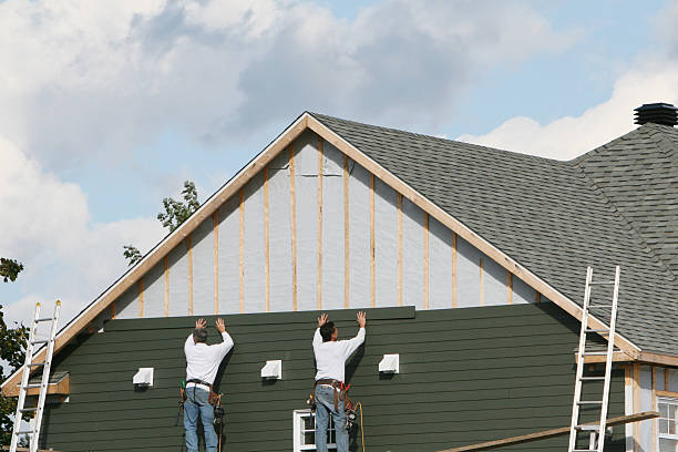 Professional Siding Replacement technician working in Blue Ball, PA
